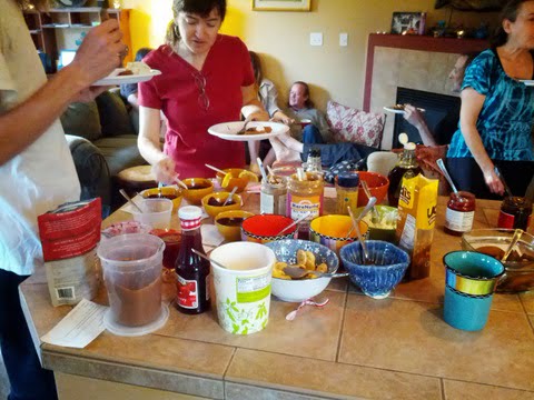 waffle party guests piling on toppings