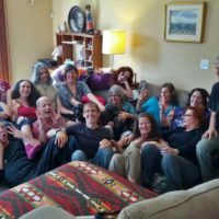 vegan waffle party guests pose for group photo