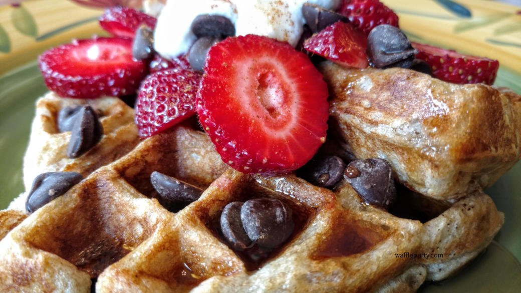 vegan waffle with strawberries and chocolate chips