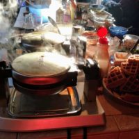 steaming waffle makers at a waffle party