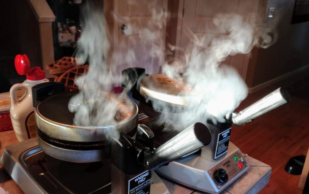 waffle makers steaming during party